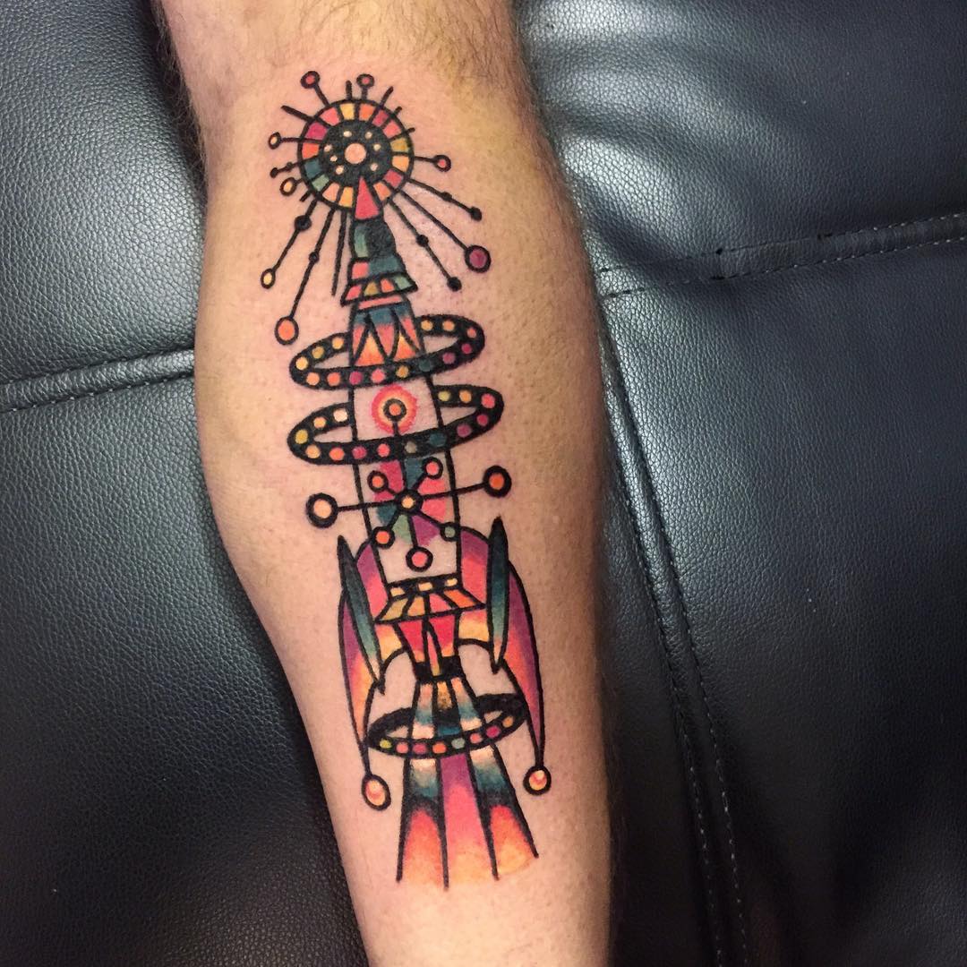 Traditional colorful rocket tattoo