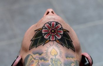 Traditional flower tattoo on the chin