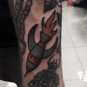 Traditional rocket tattoo