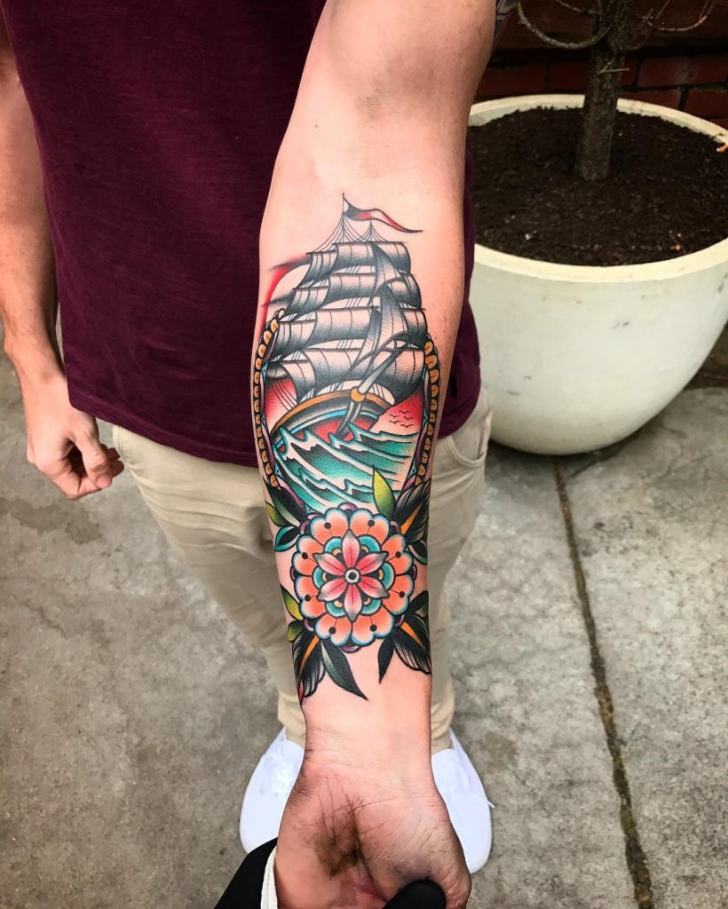 Traditional ship in the sea tattoo