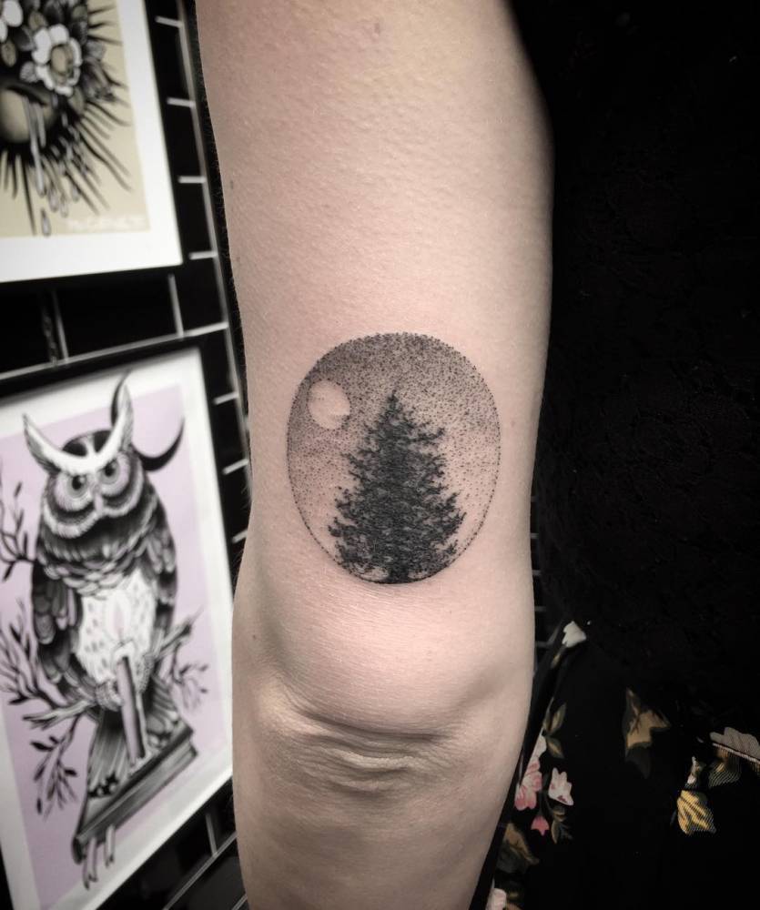 Tree in a circle tattoo