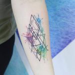 Triangles and watercolor splashes tattoo