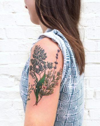 Wildflowers tattoo on the left upper arm
