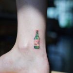 Wine bottle tattoo on the ankle