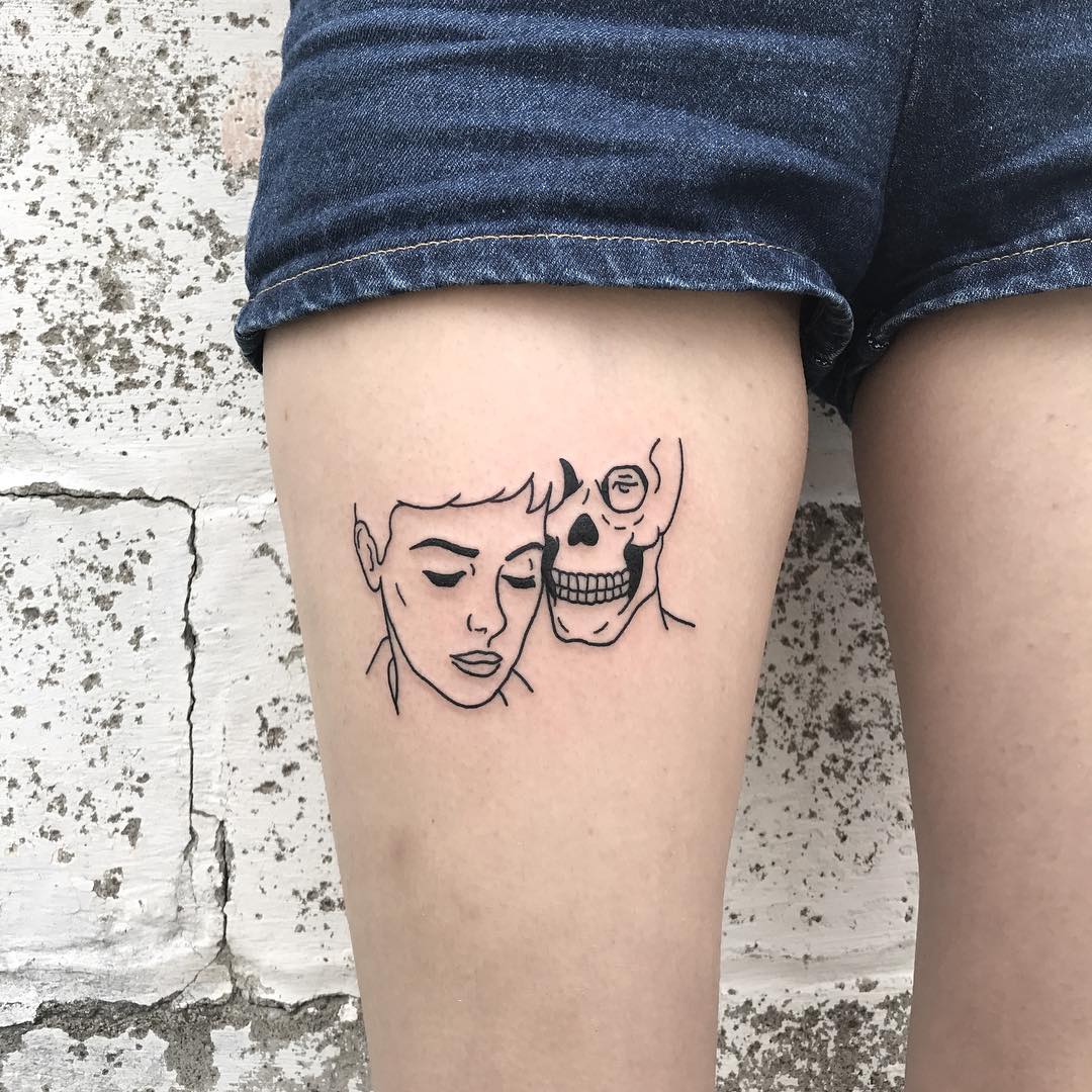 Young woman and skeleton tattoo
