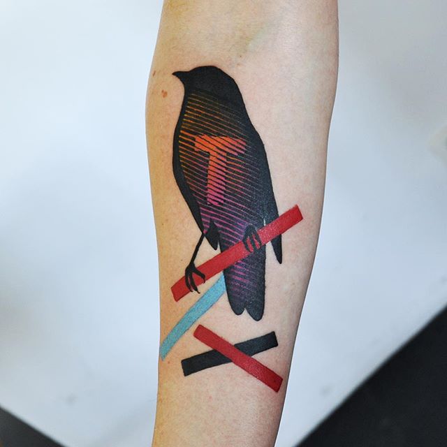 Abstract bird and sticks tattoo