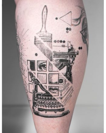 Abstract face and typewriter tattoo