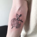 Baldwin apple tattoo