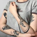 Beautiful black tattoos on arms