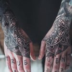 Beautiful matching stylized flower tattoos