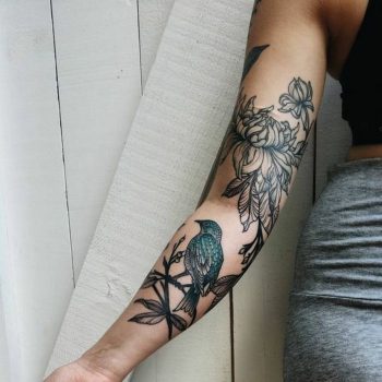 Bird and flowers tattoo