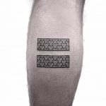 Black seamless cube pattern tattoo