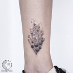 Black and grey mushrooms tattoo