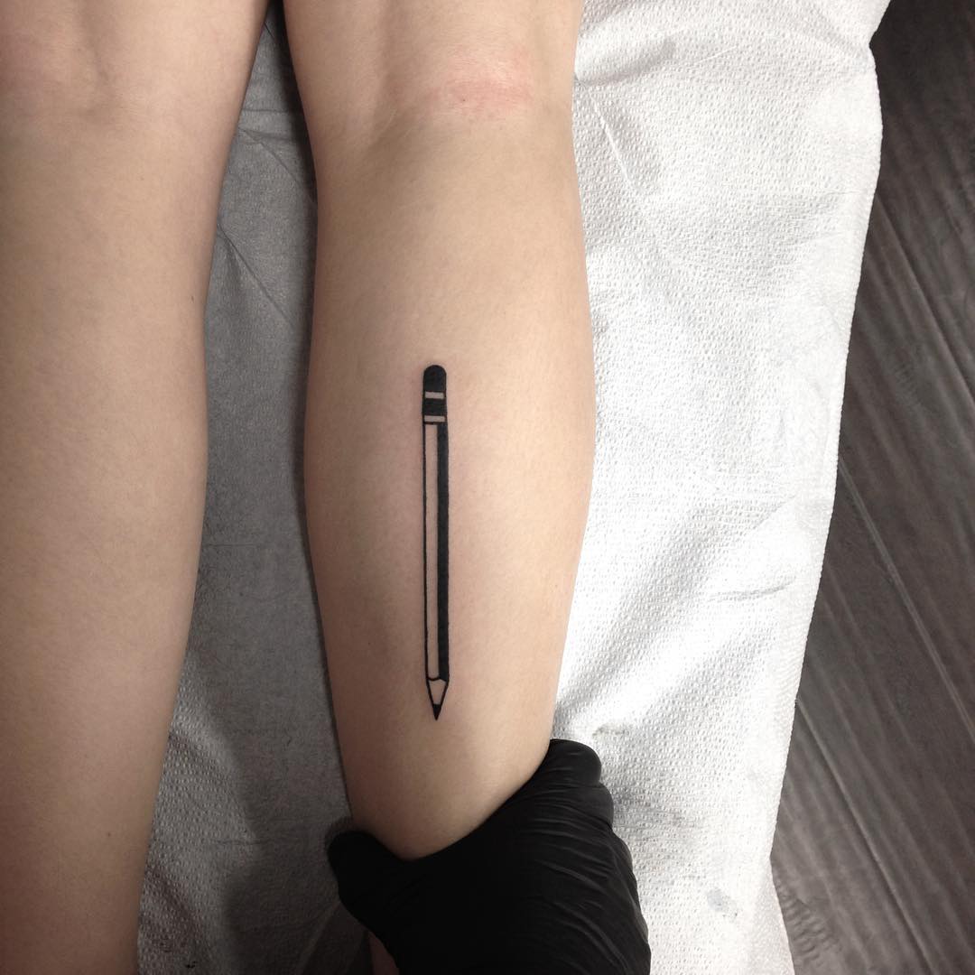 Black and grey pencil tattoo