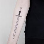 Black and grey sword tattoo
