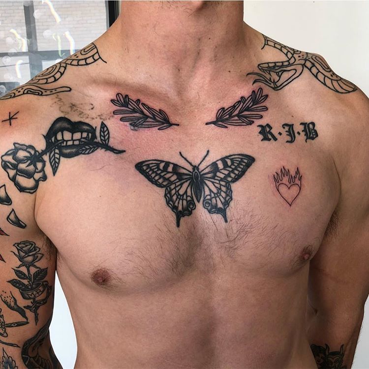 Black butterfly and other tattoos