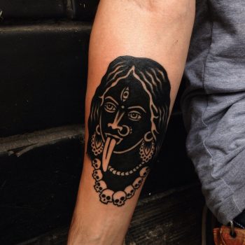 Black devil woman tattoo