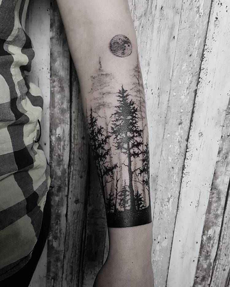 Black forest and a moon tattoo