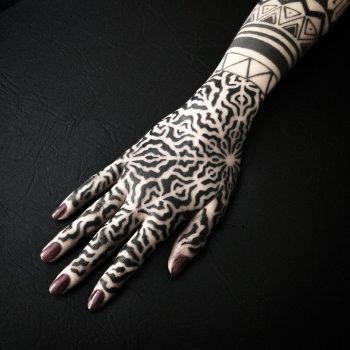 Black ornamental pattern on the hand