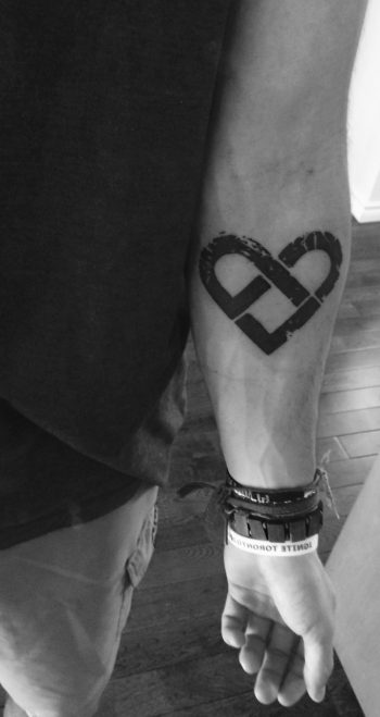 Black pretzel tattoo