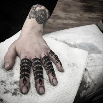 Branches with leaves on fingers