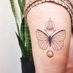 Butterfly and geometric shapes tattoo