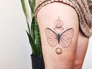 Butterfly and geometric shapes tattoo