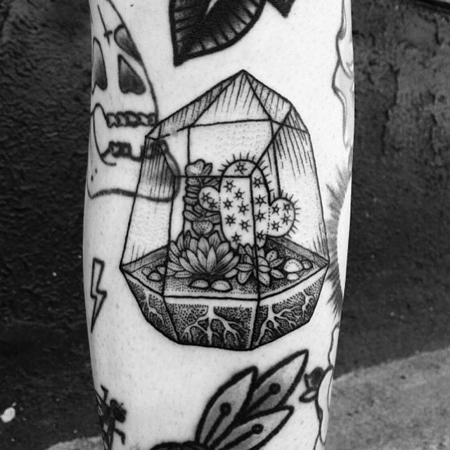 Cacti in a terrarium tattoo