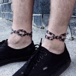 Chain tattoos on ankles