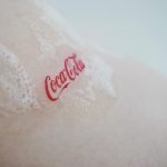 Coca cola logo tattoo