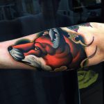 Colorful fox tattoo on the arm