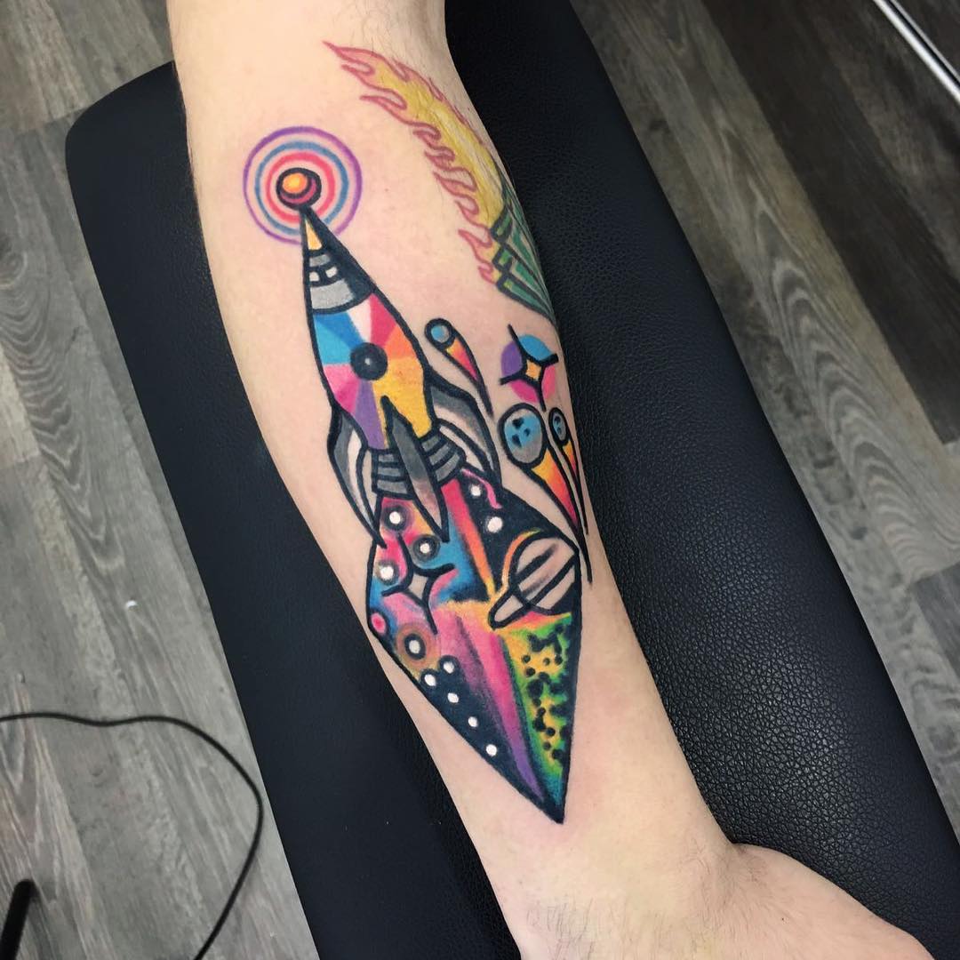 Colorful rocket tattoo