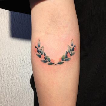 Colorful wreath tattoo