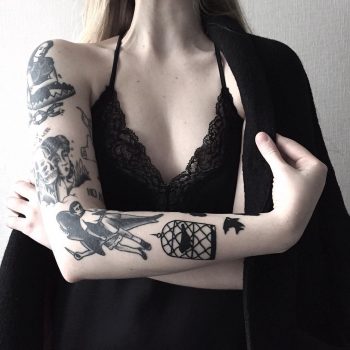 Cool black tattoos on the right arm