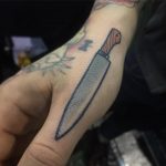 Cool knife tattoo on the thumb