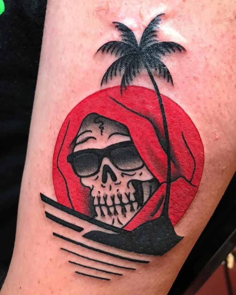 Cool skull and sunset tattoo