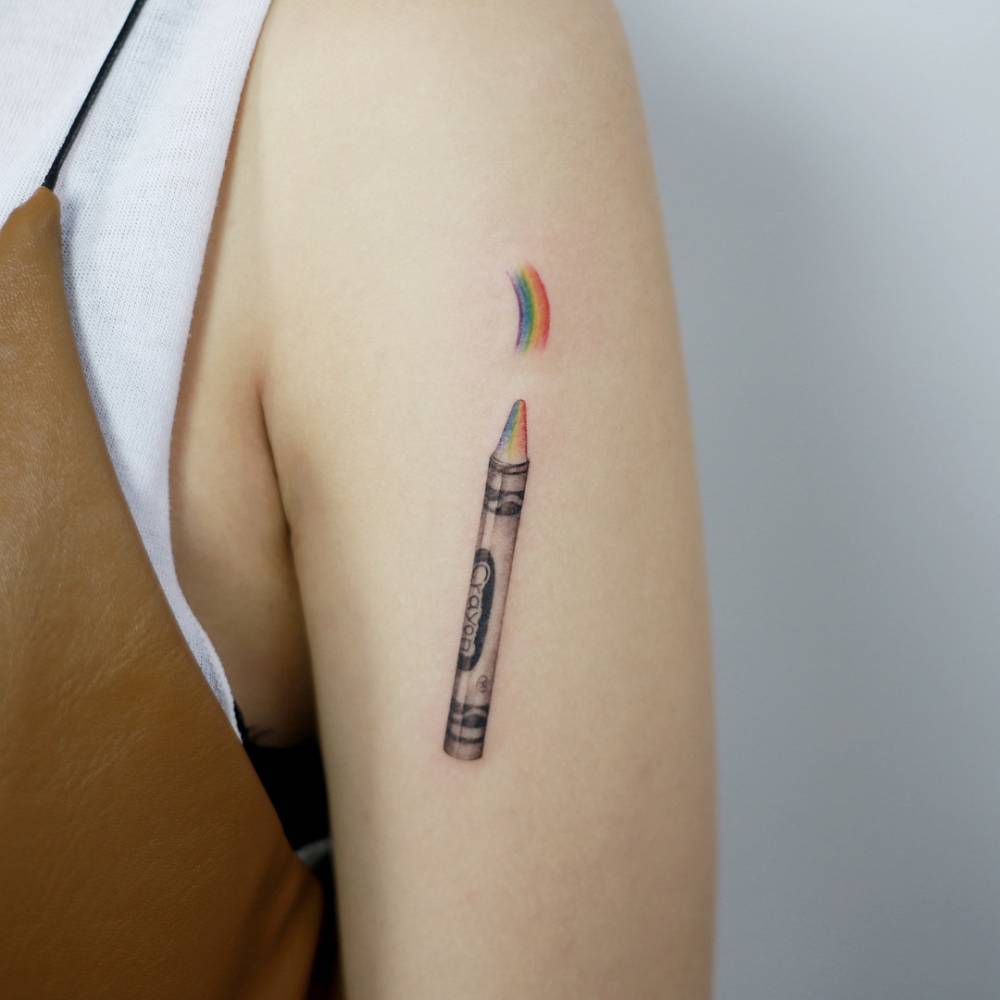 Crayola tattoo on the arm