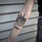 Cute anime creature tattoo