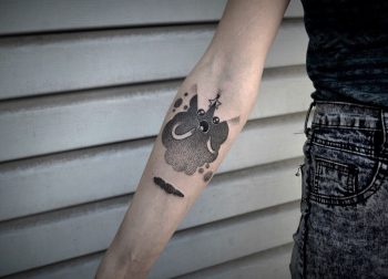 Cute anime creature tattoo