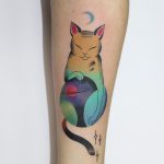 Cute cat holding a globe