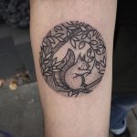Cute circular tattoo of a squirrel