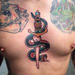 Dagger legs and snake tattoo