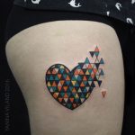 Deconstructed geometric heart tattoo