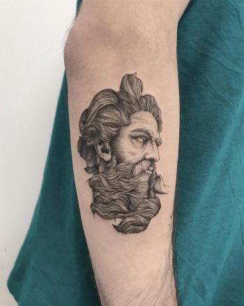 Detailed man's head tattoo