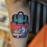Double exposure backpack tattoo