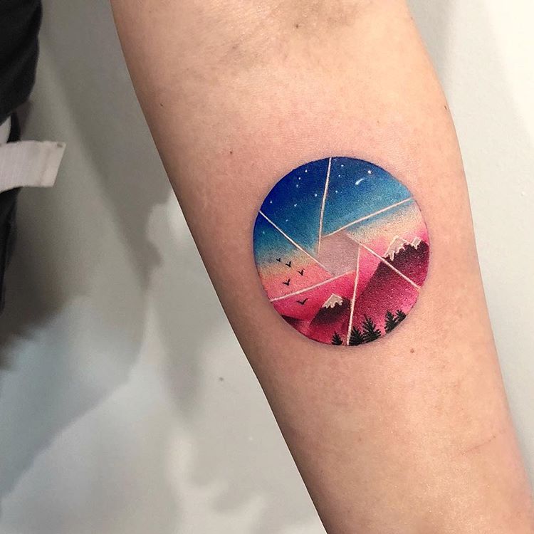 Double exposure landscape and aperture tattoo