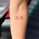 Double x tattoo