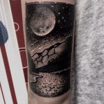 Full moon and landscape tattoo