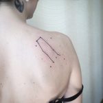 Gemini constellation tattoo on the shoulder blade