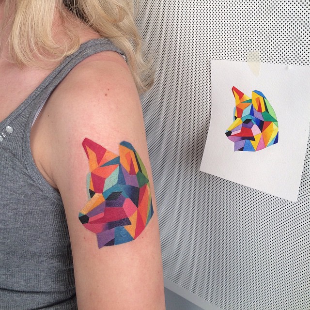 Geometric colorful wolf head tattoo